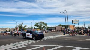 The Lethbridge Police Service participating in the Whoop-Up Days Parade, August 20, 2024. (Photo: J. Goulet, My Lethbridge Now)