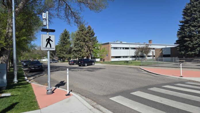 A crosswalk at 12 Ave. S. and 22 St. S. in Lethbridge, by Gilbert Paterson Middle School, seen on May 14, 2025. (Photo: J. Goulet, My Lethbridge Now)
