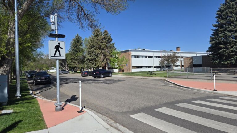 A crosswalk at 12 Ave. S. and 22 St. S. in Lethbridge, by Gilbert Paterson Middle School, seen on May 14, 2025. (Photo: J. Goulet, My Lethbridge Now)