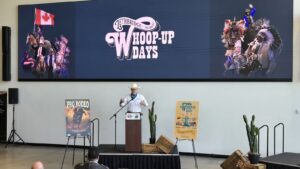 Lethbridge mayor Blaine Hyggen speaks to the crowd as details are unveiled for the 2025 Whoop-Up Days festival, May 29, 2025. (Photo: J. Goulet, My Lethbridge Now)