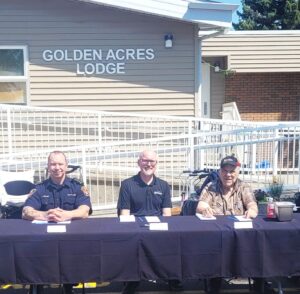 Calm before the storm. Judges, including Mayor Blaine Hyggen, get ready to taste some soup.<br />(Photo by Stan Ashbee)