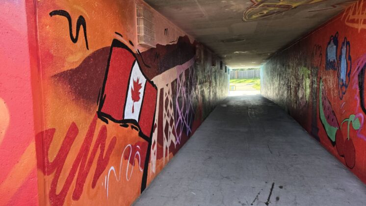 A Canadian flag is one of the images featured inside the tunnel. (Photo: J. Goulet, My Lethbridge Now)