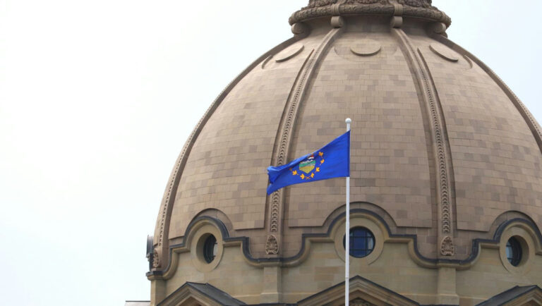 The Alberta flag flies at the legislature building in Edmonton on June 26, 2025. | John K. White photo